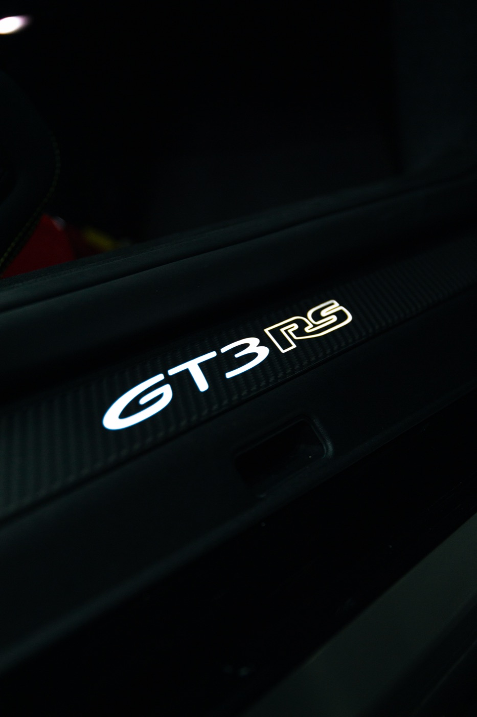 Beleuchteter Einstiegsschweller mit GT3-RS-Schriftzug
